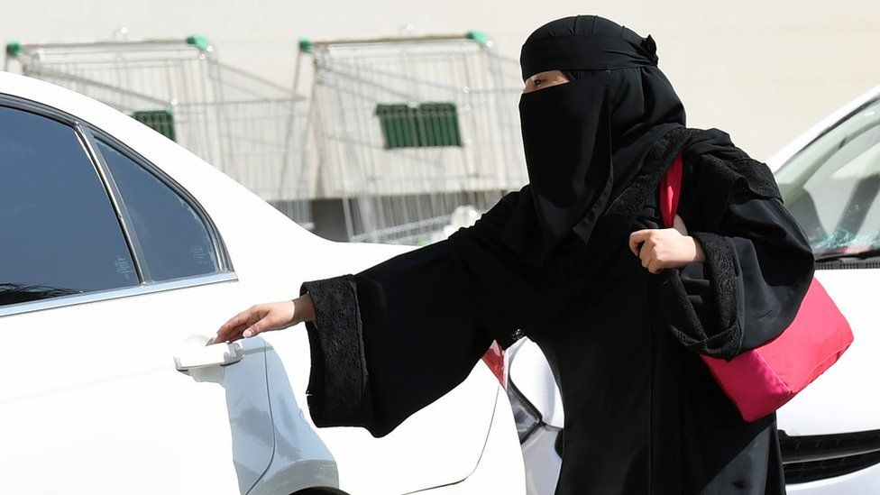 Woman from Saudi Arabia gets in car