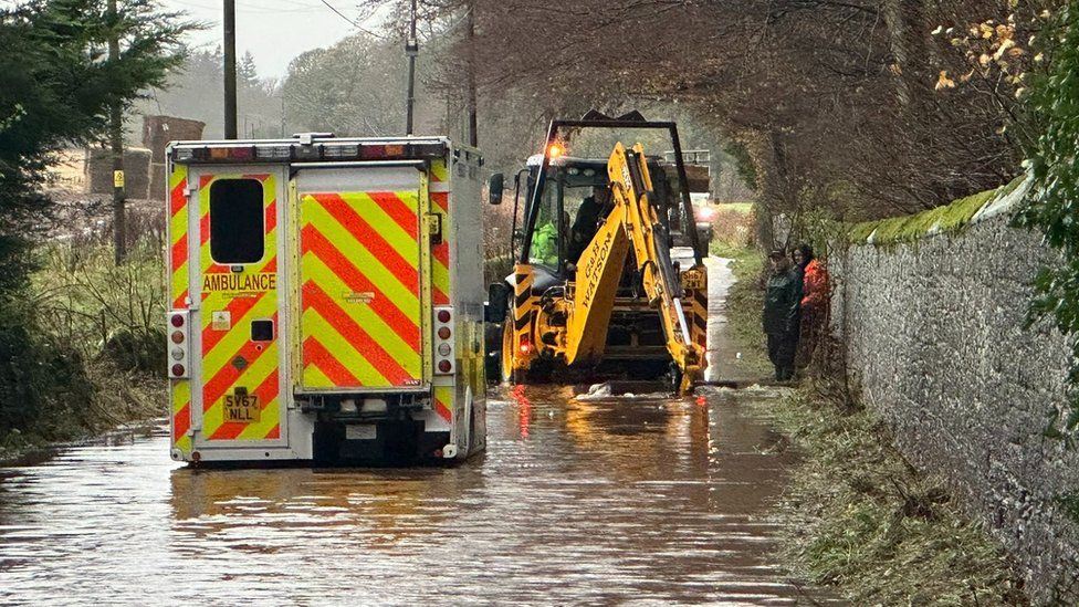 An ambulance was trapped in flood water in Brechin