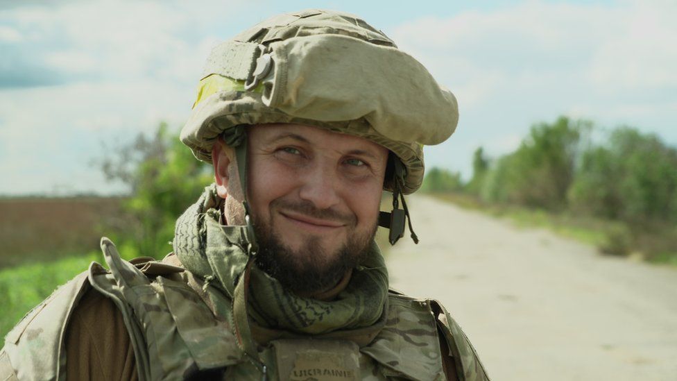Vasyl, a deputy commander of the regiment in uniform smiling at the camera