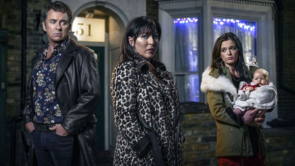 Shane Richie as Alfie Moon, Jessie Wallace as Kat Moon and Katie Jarvis as Hayley Slater holding baby Cherry Slater in 2018