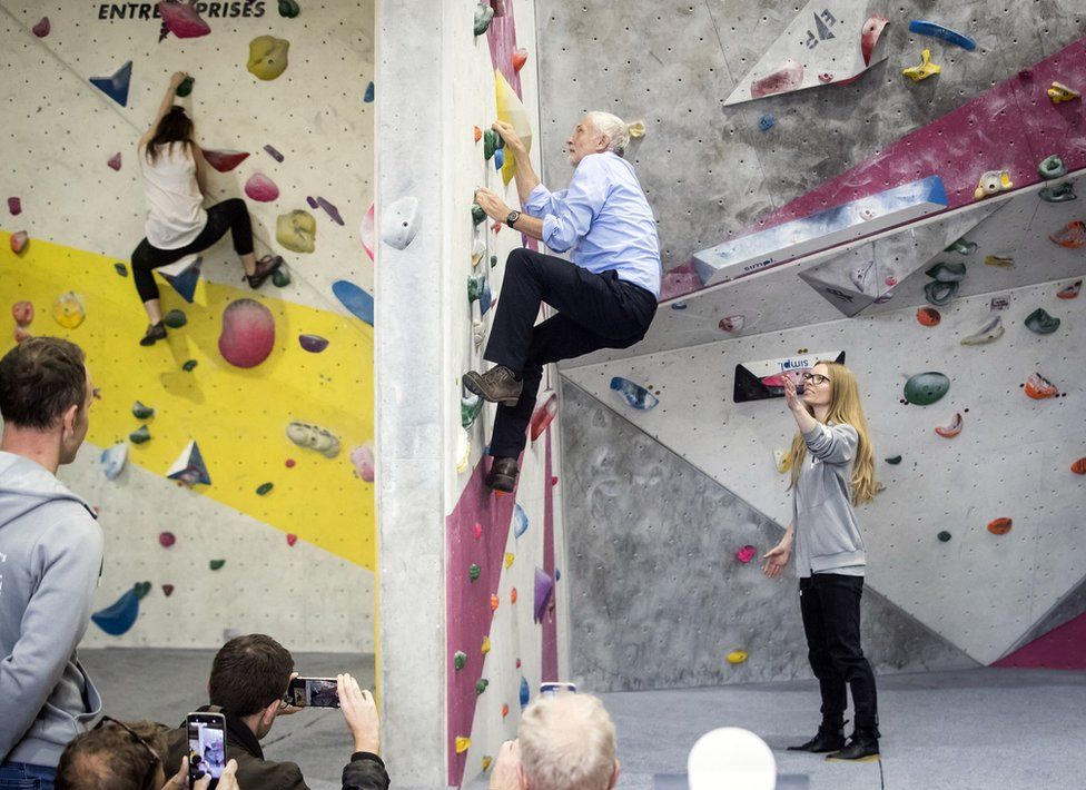 Labour leader Jeremy Corbyn on a climbing wall