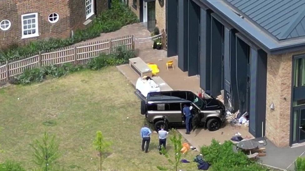 A Land Rover Defender is seen inside the grounds of The Study Preparatory School in Camp Road, Wimbledon, south London.