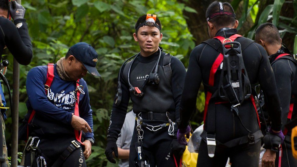 Thai divers take part in rescue operations for 13 people trapped in the Tham Luang cave