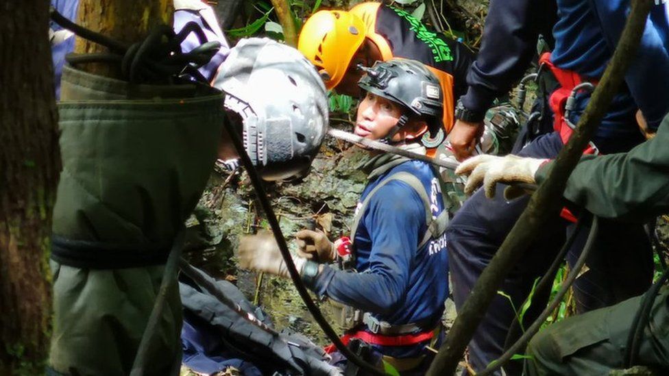 Rescue workers attempt to drill a hole to access the Tham Luang Nang Non cave in northern Thailand