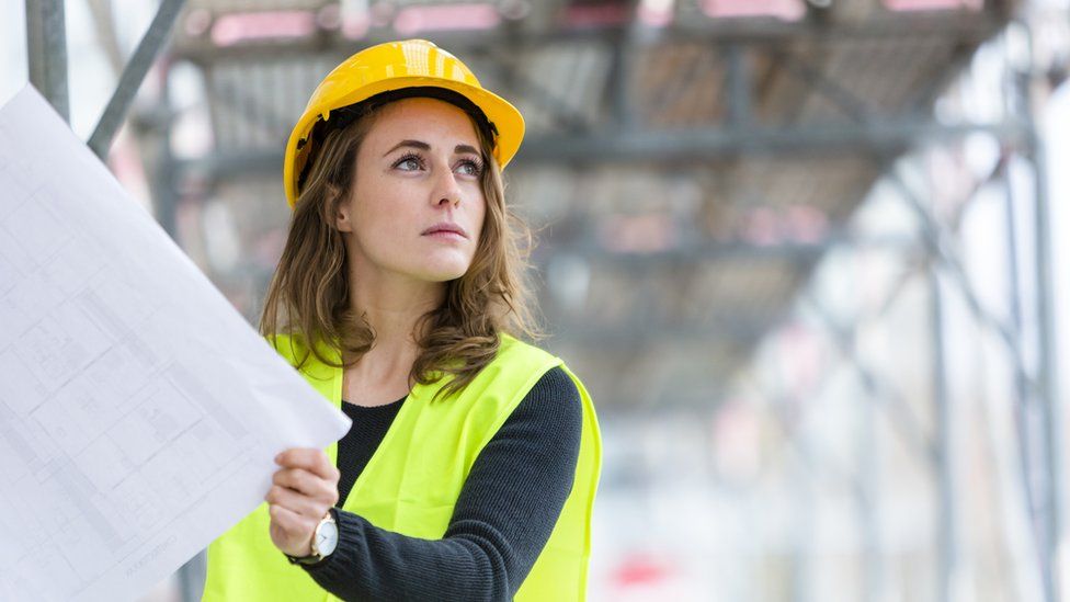 young woman on construction site