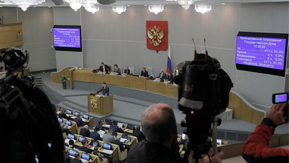 The screens show the results of vote on the Russia's lower house of parliament