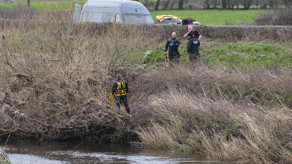 Police divers were seen working by the River Wyre