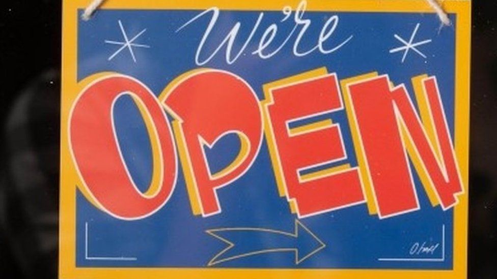 Shop sign saying open