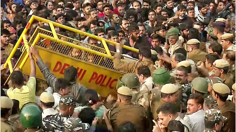 Students clashing with police in Delhi