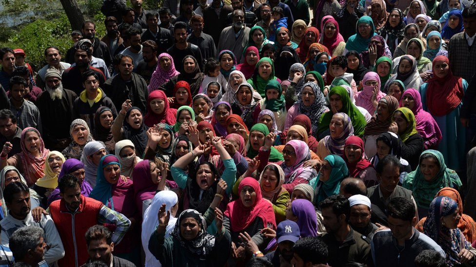 Kashmiri mourners shout pro-freedom slogans during the funeral of taxi driver Ali Muhammad Dagga, 55, who died when when he and the car he was driving were caught in clashes between Kashmiri protestors and Indian government forces