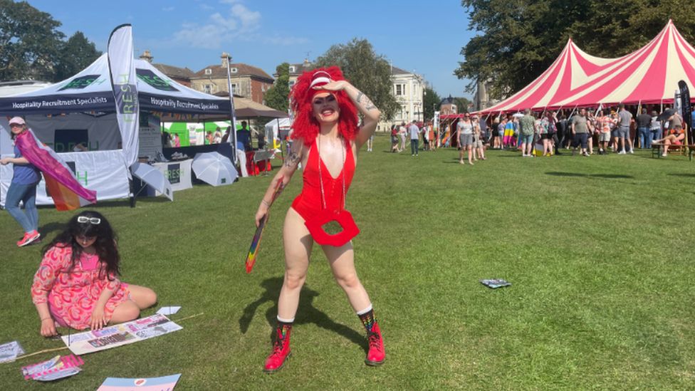 A photo of a woman wearing red clothes