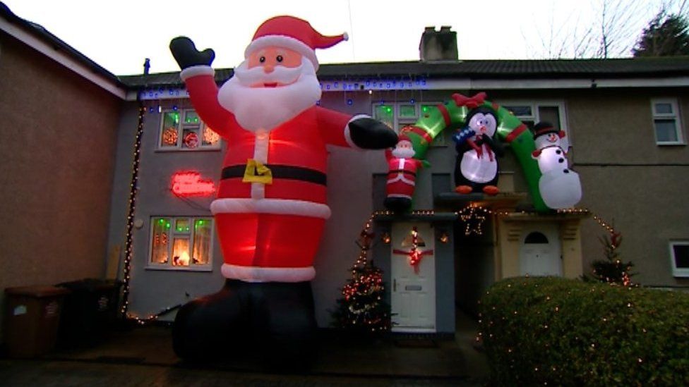 Giant Santa towers over house in Swadlincote