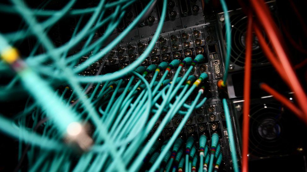Cables and computers are seen inside a data centre at an office in the heart of the financial district in London, 15 May 2017