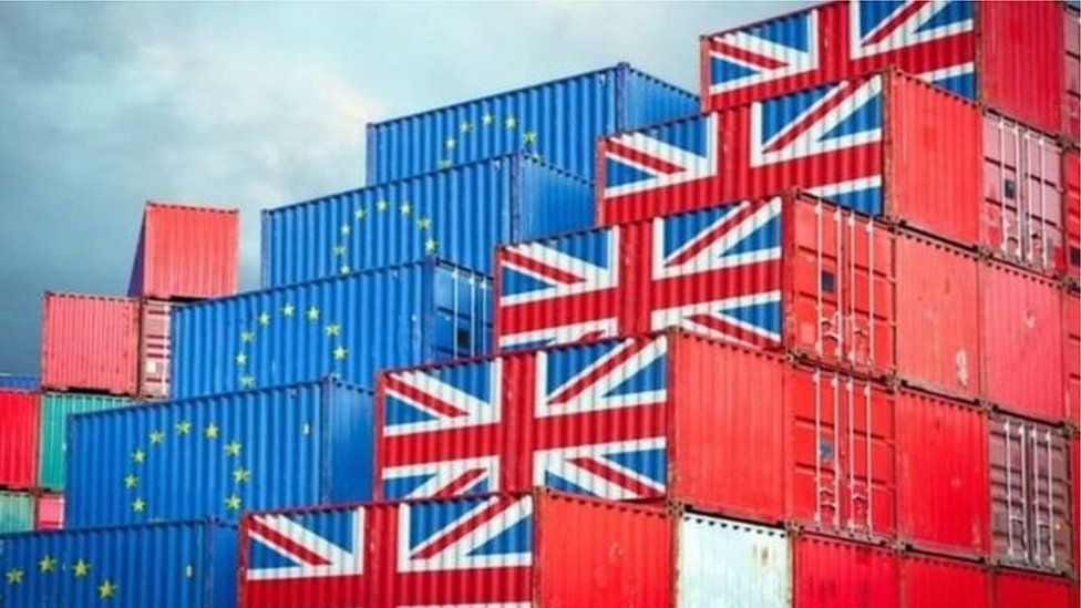 Shipping containers marked with EU and union flags