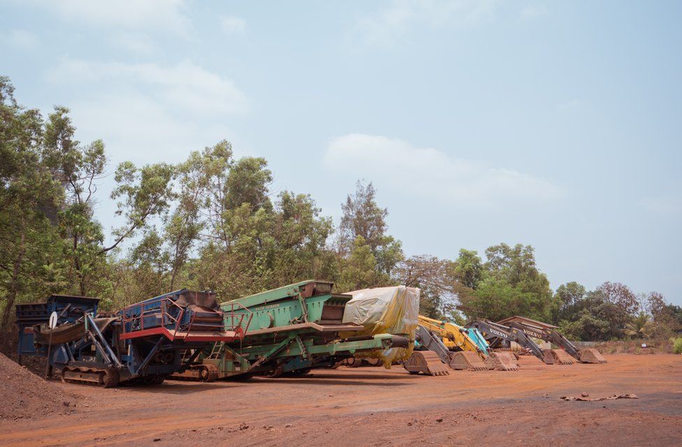 Mining machinery in Sonshi is now parked next to a primary school.
