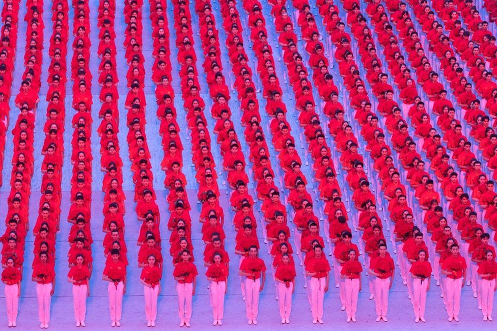 Performers take part in a show commemorating the 100th anniversary of the founding of the Communist Party of China at the National Stadium in Beijing, China, on 28 June 2021