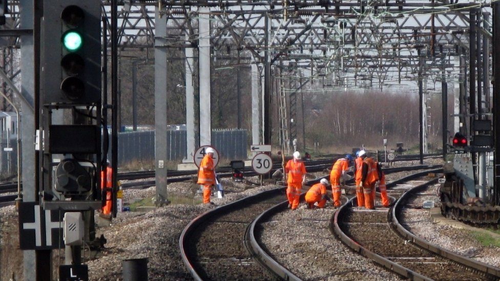 Rail workers on track