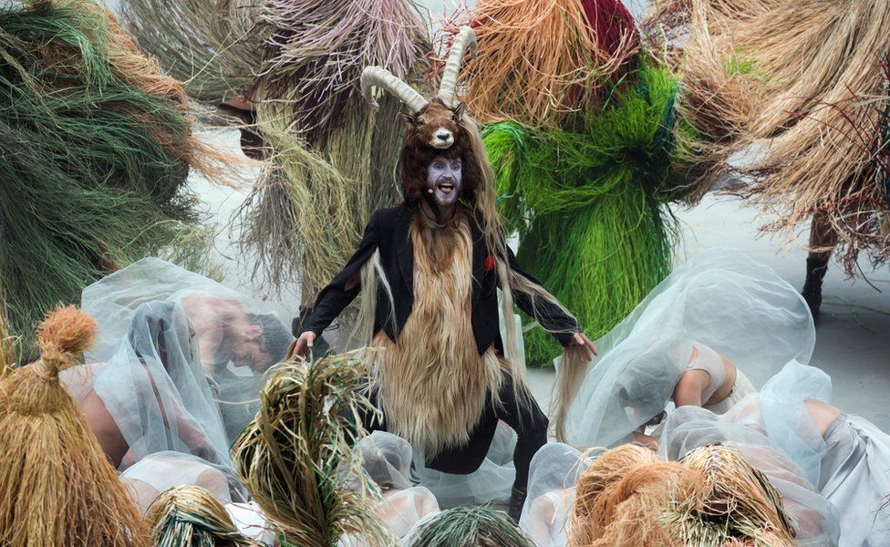 Man dressed as a goat during the opening show directed by German director Volker Hesse, on the opening day of the Gotthard rail tunnel, the longest tunnel in the world - 1 June 2016