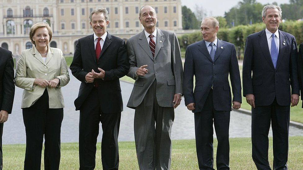 From left to right: Angela Merkel, Tony Blair, Jacques Chirac, Vladimir Putin and George W Bush
