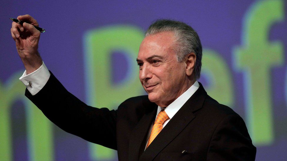 Brazil's President Michel Temer gestures during the opening ceremony of the 20th conference of the march in defence of the municipalities in Brasilia, Brazil, 16 May