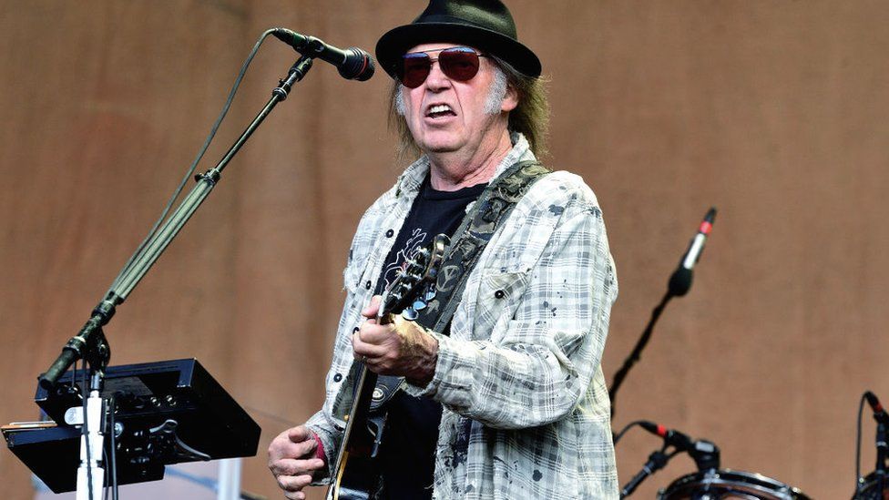 Neil Young performing in 2019