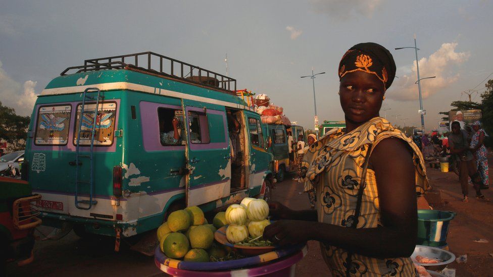 An orange vendor in Bamako, Mali
