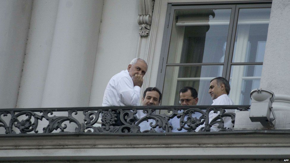 Iranian officials gather on a balcony of the Palais Coburg Hotel, Vienna. 11 July 2015