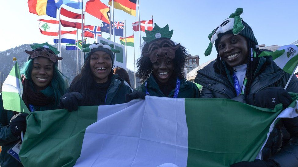 Nigeria's women's bobsleigh and skeleton team members Seun Adigun, Ngozi Onwumere, Akuoma Omeoga and Simidele Adeagbo attend a welcoming ceremony for the team in the Olympic Village in Pyeongchang ahead of the Pyeongchang 2018 Winter Olympic Games on February 6, 2018.