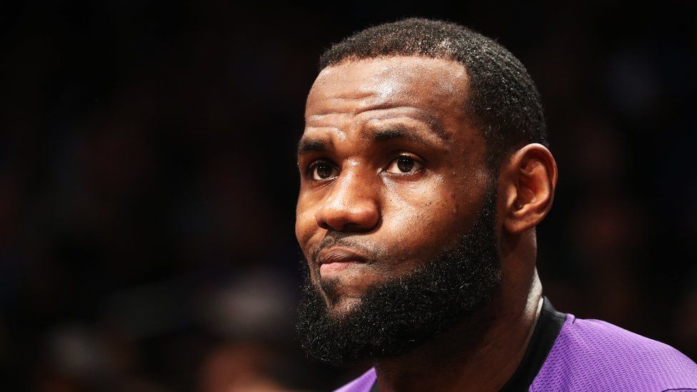 LeBron James of the Los Angeles Lakers looks on against the Brooklyn Nets during their game at the Barclays Center on December 18, 2018 in New York City.