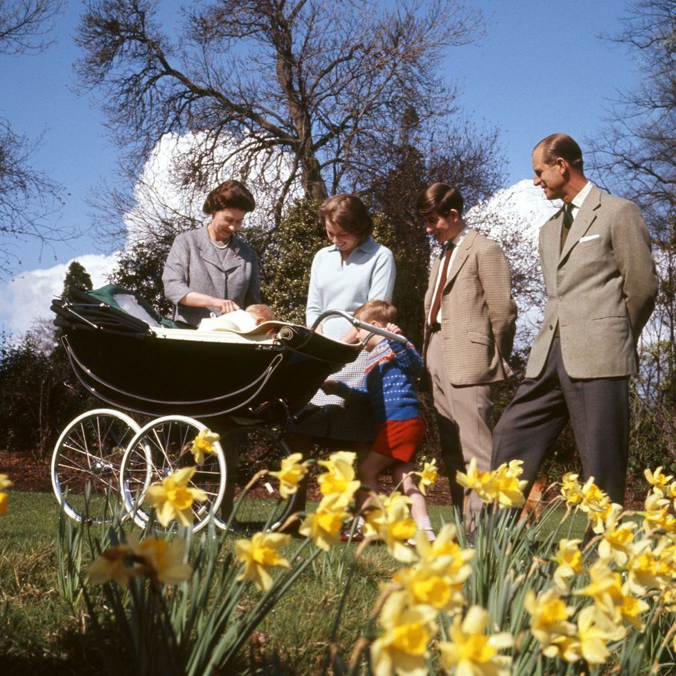 Queen Elizabeth II, baby Prince Edward, Princess Anne, Prince Andrew, Prince Charles and the Duke of Edinburgh, in the gardens of Frogmore House, Windsor, Berkshire