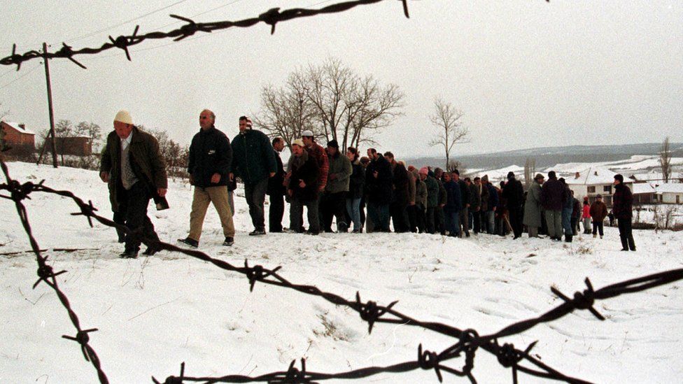 Ethnic Albanians mourn in Kosovo, 1999