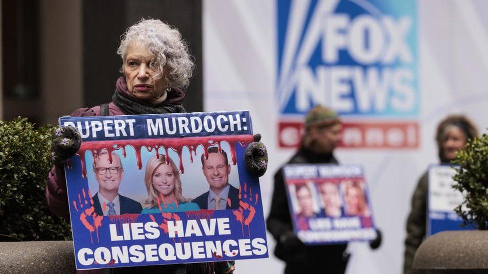 A protester outside Fox's New York offices