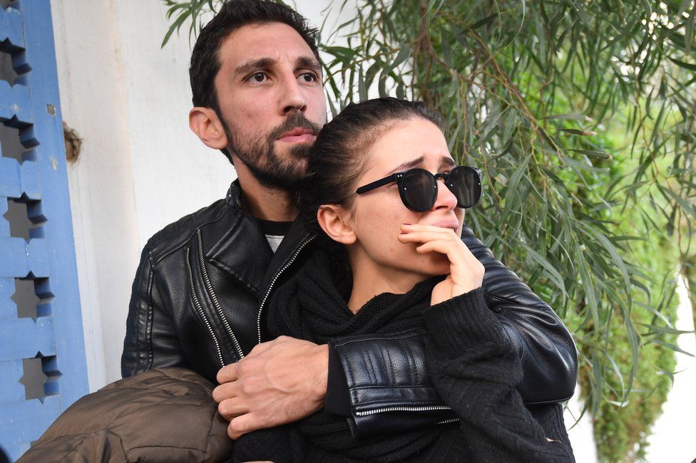 Mourners attend the funeral of the late Tunisian fashion designer Azzedine Alaia, who died this month aged 77, in the Sidi Bou Said cemetary in the capital Tunis on November 20, 2017.