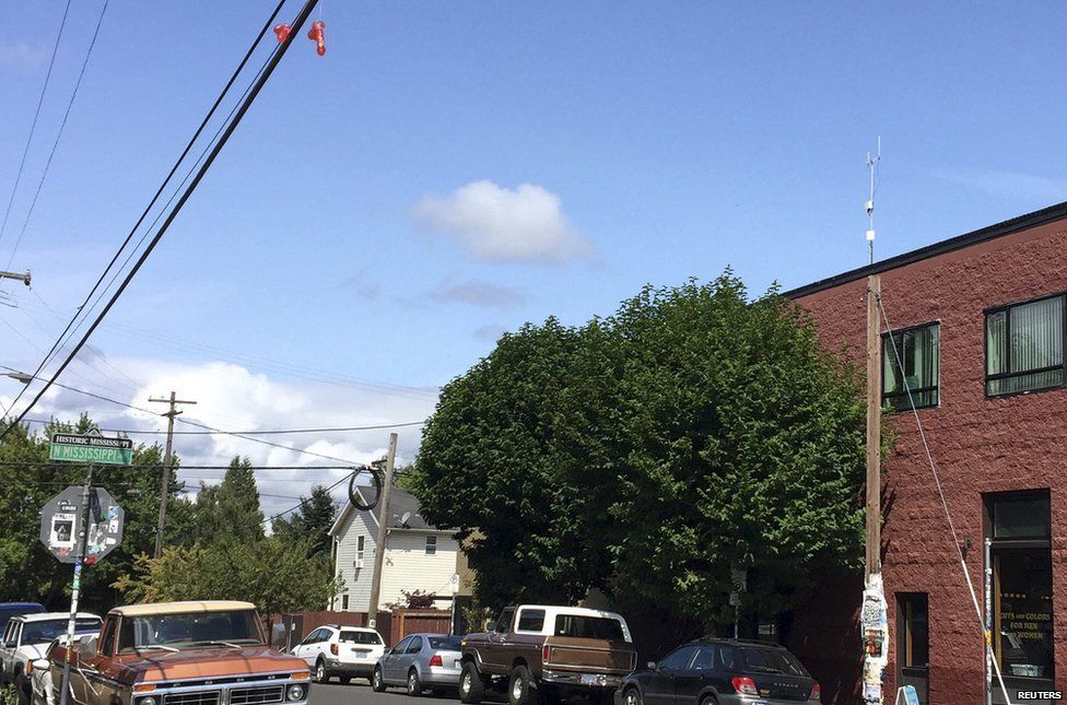 Mystery over sex toys dangled from power lines in Portland Oregon