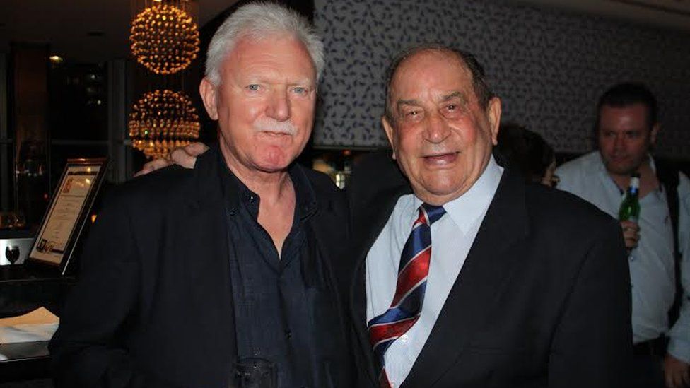 Dave Bolton (right) with Wigan chairman Ian Lenagan in Sydney in 2014