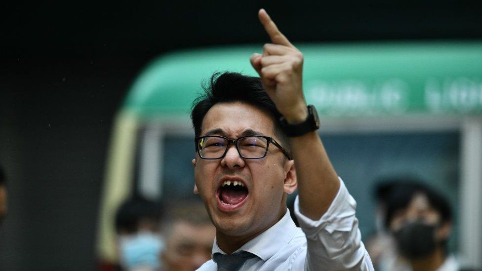 A man yells at police during a protest in Hong Kong's Central district on November 11, 2019.