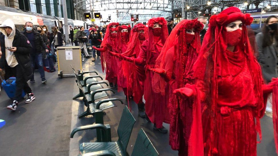 Red Rebel Relay at Glasgow Central Station