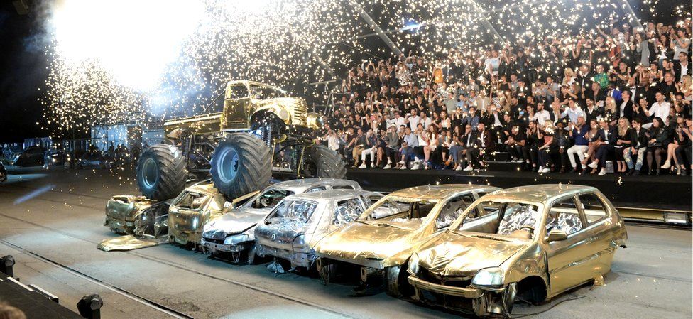 Cars are crushed at a Philipp Plein fashion show