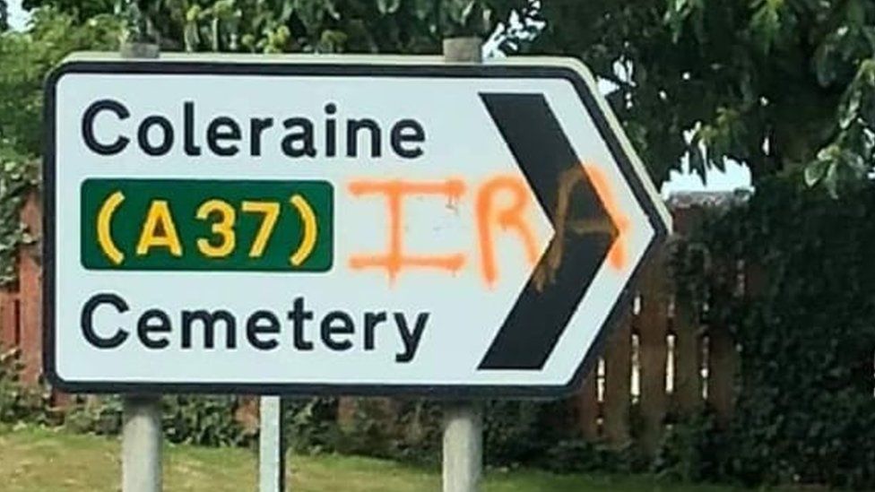 Graffiti on road sign in Limavady