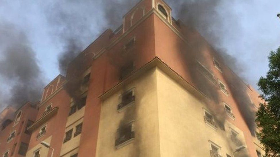 Smoke billows from a fire at a residential complex used by state oil giant Saudi Aramco in Khobar, Saudi Arabia, 30 August 2015