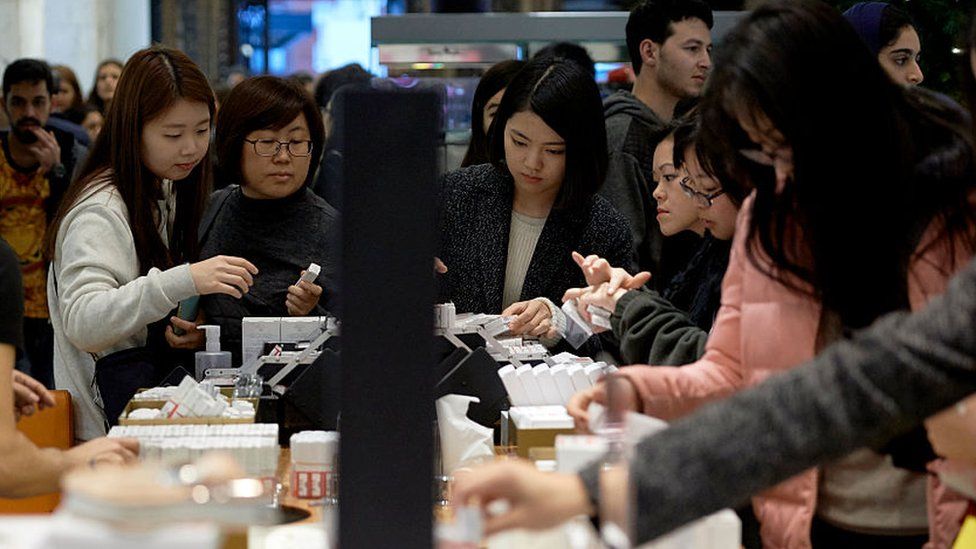 Shoppers in Selfridges, London