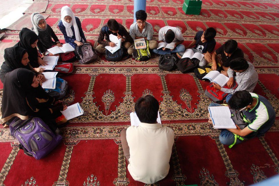 Kashmiris attending alternate classes in Srinagar.