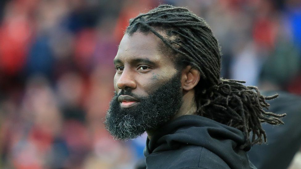 Wretch 32 pitch side at the UEFA Champions League Semi Final in May 2019