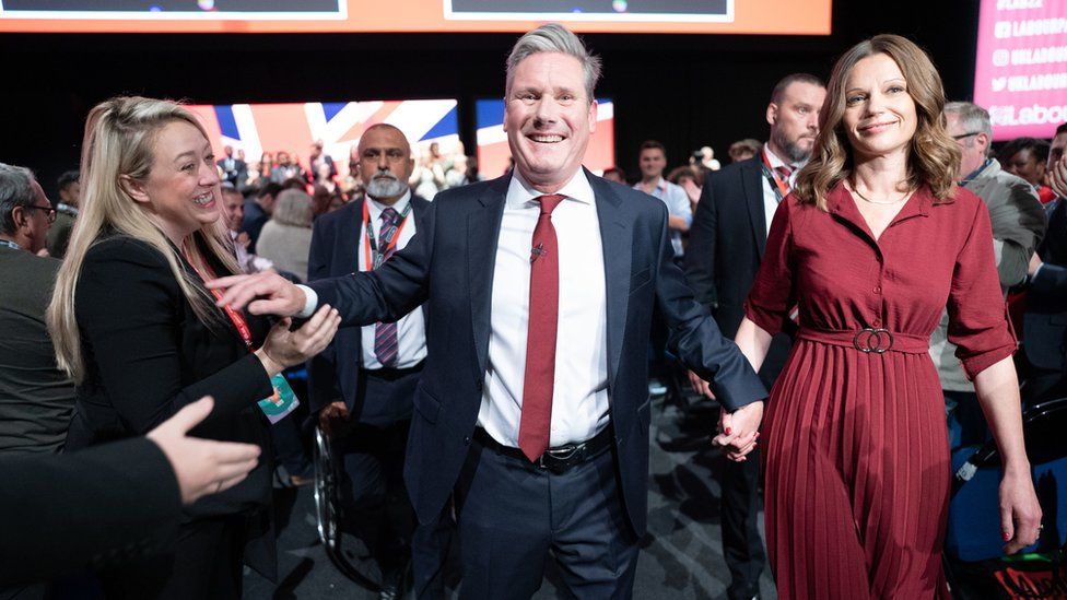 Keir Starmer greets supporters with his wife Victoria after delivering the keynote speech at the Labour Party conference