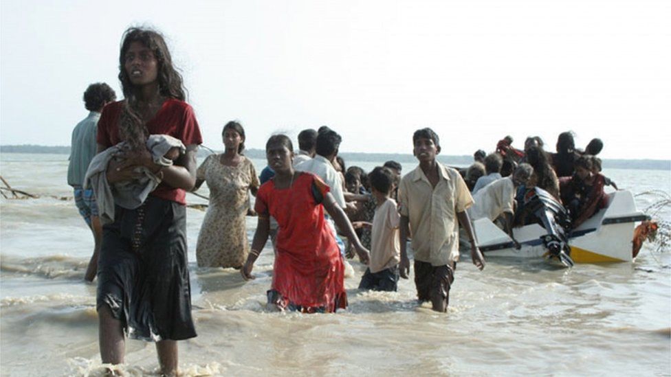 This handout picture released by the Sri Lankan Army on May 15, 2009 allegedly shows civilians who managed to escape from the last remaining Tamil Tiger rebel-held patch of coastline in the northeastern district of Mullaittivu.
