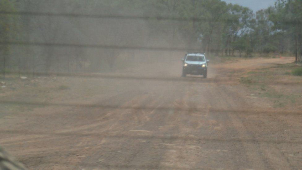 A vehicle following the BBC crew near the mine