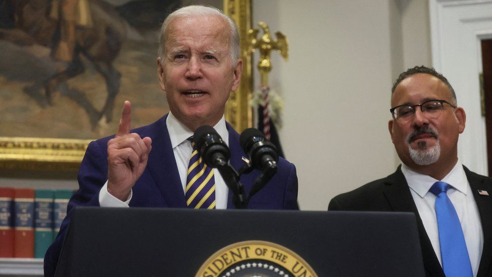 US President Joe Biden announcing student loan relief with Education Secretary Miguel Cardona