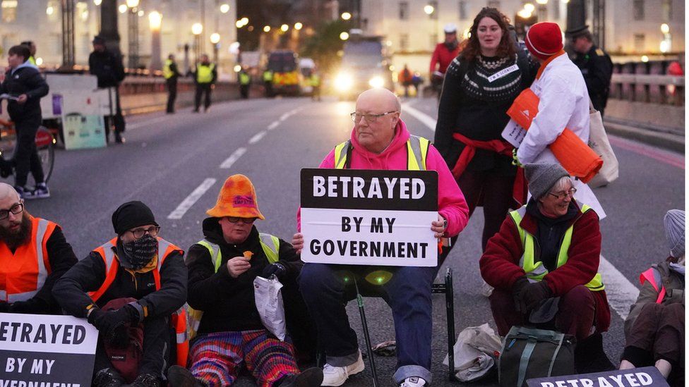 Climate activists protesting on Lambeth Bridge