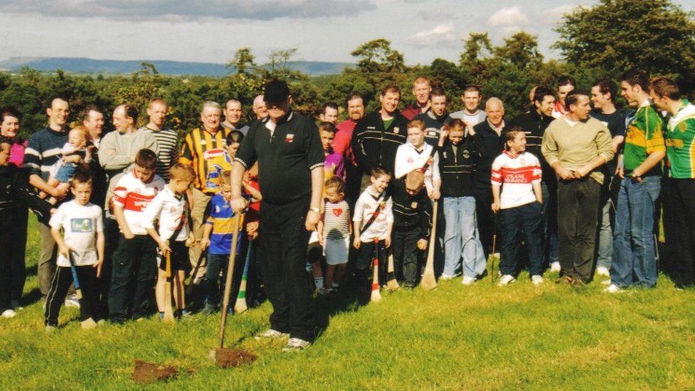 liam hinphey turning the first sod at football pitch