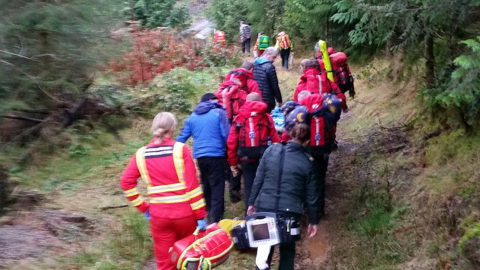 Aberdyfi Search and Rescue Team carry the patient following the incident